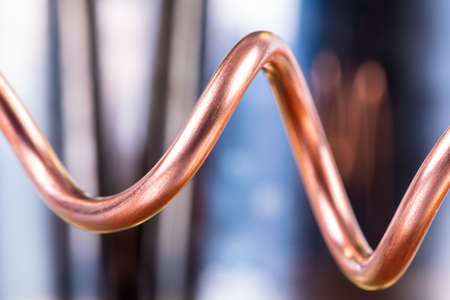 Abstract Copper Wire Close-up with Bokeh Backgroundの写真素材