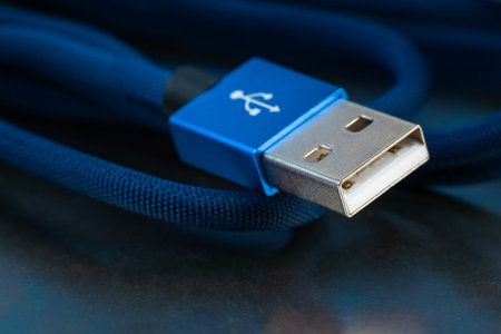 Usb cable on metallic background