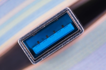 Macro of usb port sticks out from closed book