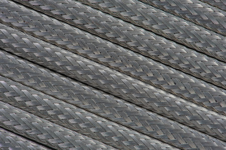 Steel protective sheath braided cable as backgroundの写真素材