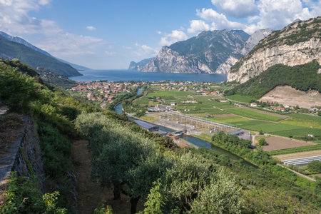 Sarca river springing from the Adamello-Presanella mountains in Italian Alps and flowing into Lake Garda at Nago-Torboleの写真素材