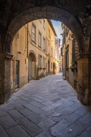 Old empty narrow street of Lucca in Tuscany Italyの写真素材