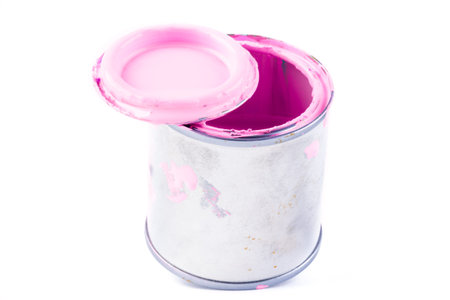 Open can of paint isolated on white background