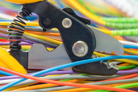 Cable cutter tool and colorful cord, service and repair networkの写真素材