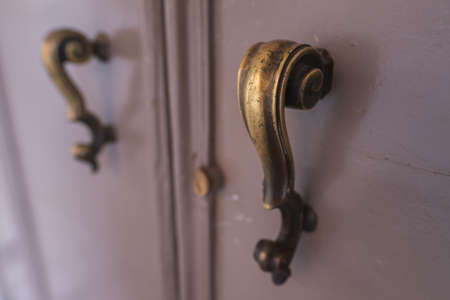Ancient italian door handle close-upの写真素材