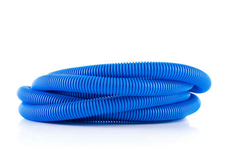 Roll of corrugated pipe tube for electrical installation isolated on white backgroundの写真素材