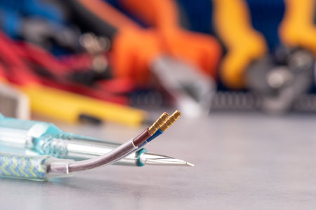 Electrical repair installation set, electric cable and screwdriver