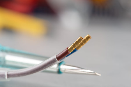 Macro of electrical cable and screwdriver, repair and service equipment