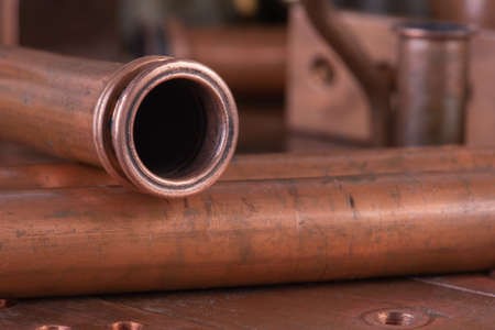 Copper plumbing fittings for water pipe installation close-upの写真素材