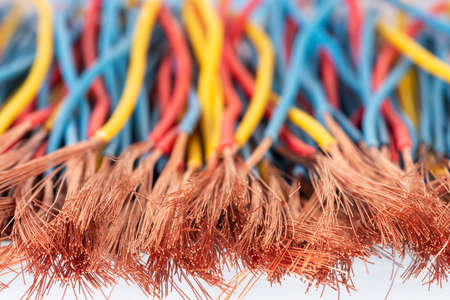 Stripped electrical copper cables, colorful industrial technology backgroundの写真素材