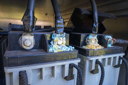 String of old battery with terminals corrode form blue and white powderの写真素材