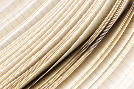 Edges of paper pages, opened lined notebook close-up