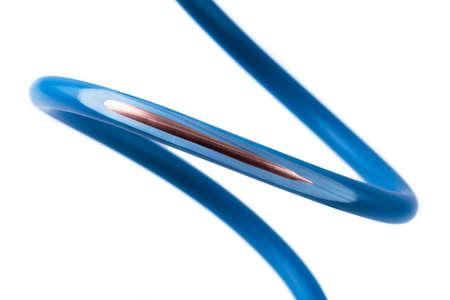 Stripped electrical copper cable wire isolated on white backgroundの写真素材