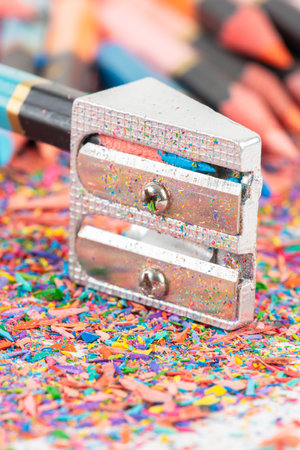 Colored pencil, sharpener and shavings close-upの写真素材