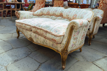 Vintage armchair in a coffee shop. Antique furniture.