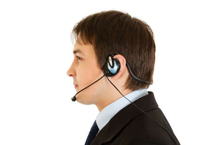 Thoughtful  modern businessman with headset isolated on white
の写真素材