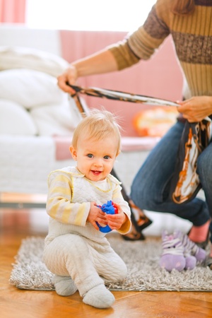 Lovely baby playing on floor at home
の写真素材