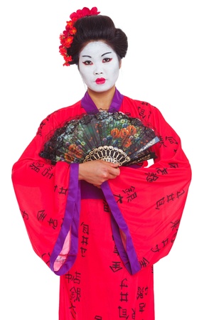 Portrait of geisha with fans isolated on whiteの写真素材
