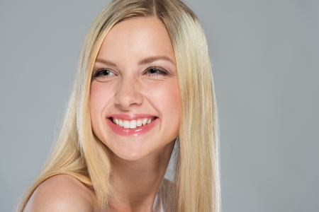 Portrait of smiling girl with blond hairの写真素材