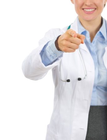 Closeup on medical doctor woman pointing in cameraの写真素材