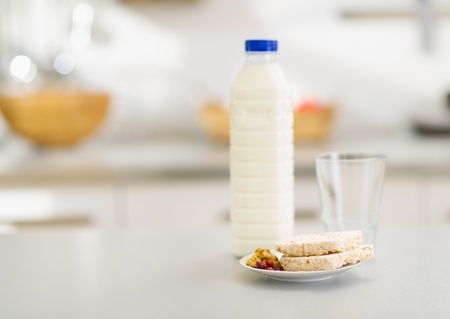 Closeup on crisp bread and milk on table in kitchenの写真素材