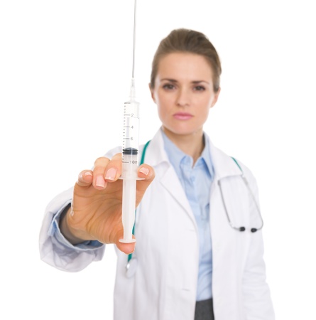Closeup on doctor woman holding syringeの写真素材