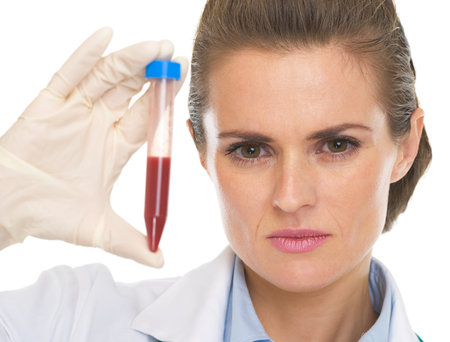 Doctor woman showing test tube