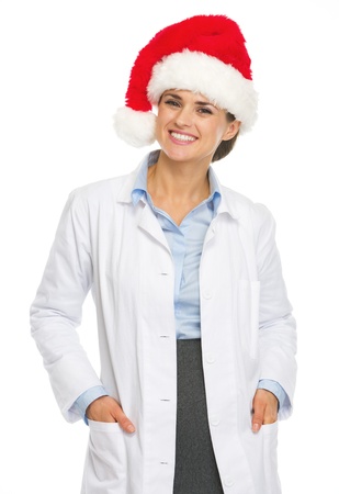 Portrait of smiling doctor woman in santa hatの写真素材