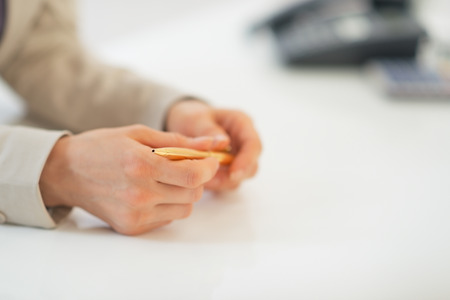 Closeup on business woman holding penの写真素材
