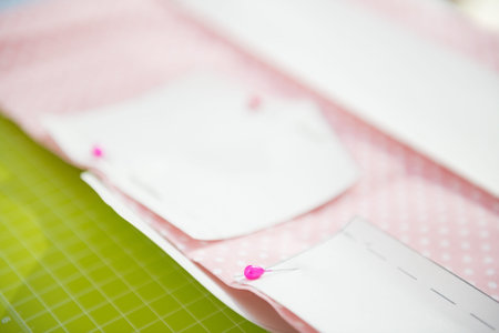 Closeup on seamstress pattern on fabric
