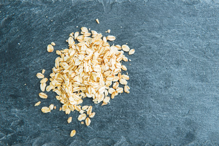 Closeup on oatmeal on stone substrate