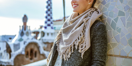 Barcelona signature style. stylish woman standing near column at Guell Park in Barcelona, Spain in the winterの写真素材