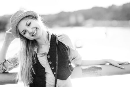 Portrait of happy hipster girl in the cityの写真素材