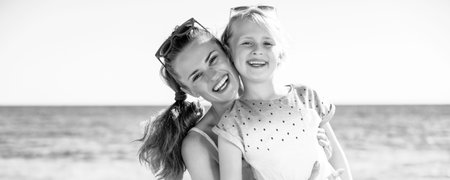 Colorful and wonderfully cheerful mood. happy trendy mother and child in colorful clothes on the...