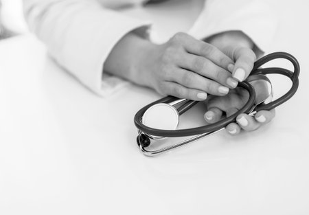 Closeup on medical doctor woman holding stethoscopeの写真素材