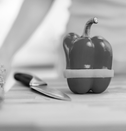 Closeup on bell pepper with sliceの写真素材