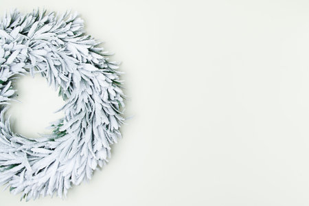 Merry Christmas. flat lay with wreath on white background.
