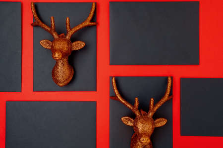 flat lay with christmas ball and credit card on red background.の写真素材