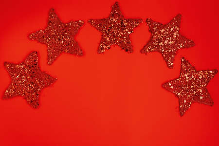 flat lay with christmas ball and credit card on red background.の写真素材