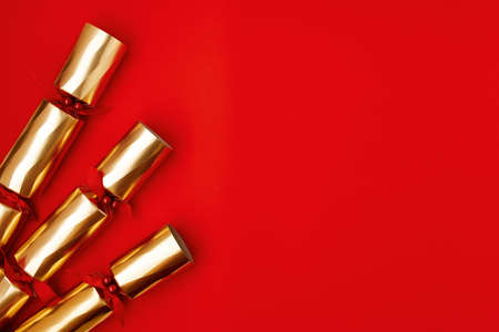 flat lay with christmas jingle bells on red background.の写真素材
