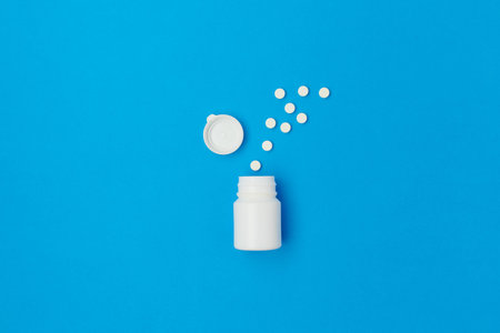 flat lay with broken christmas ball on toilet paper tubes background.