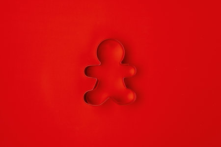 flat lay with christmas jingle bells on red background.の写真素材