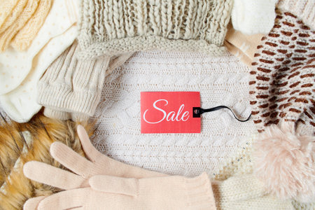 winter flat lay with snowflakes and conifer cones on white background.の写真素材