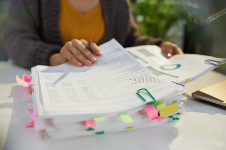 tax time. accountant woman working with documents.の写真素材