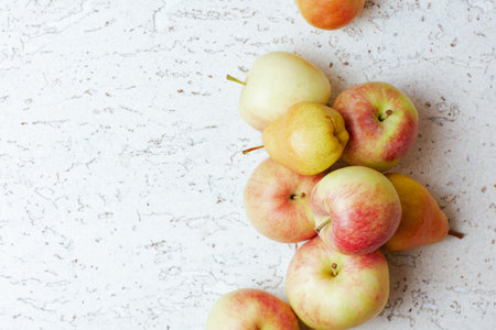 autumn flat lay with apples and pears.