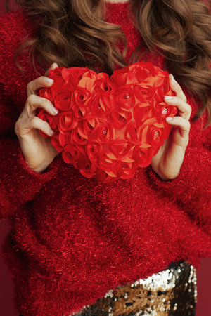Happy Valentine. Closeup on woman with red heart.の写真素材