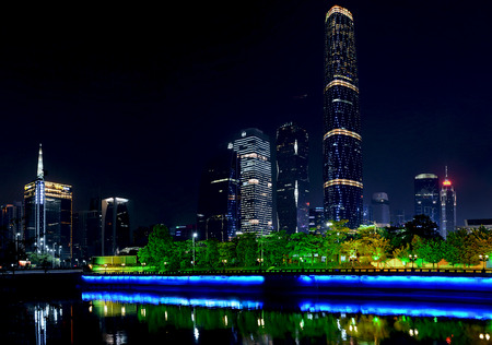 night cityscape of the financial centre (Zhujiang New Town) in Guangzhou, China. View of the Pearl River with reflections of lights in the water.のeditorial素材