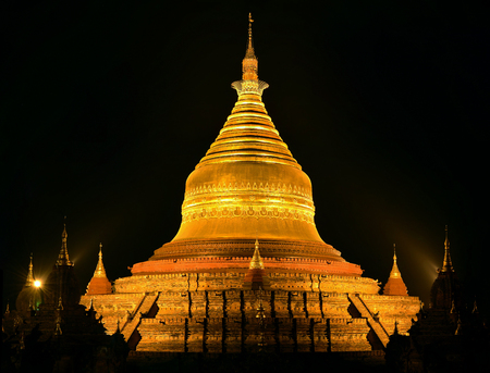 Beautiful view of the Dhammayazika Pagoda in golden light on the background of night sky. Bagan, Myanmar.の写真素材