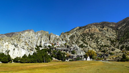 Buddhist monastery at the foot of the mountain near Manang village, Annapurna Conservation Area, Nepal.の写真素材