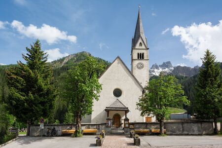 Chiesa dei Santi Pietro e Paolo Apostoli - catholic church of Saints Peter and Paul in Arabba, Trentino, Italyの写真素材